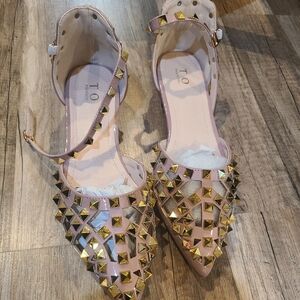 Cute soft pink/gold flats shoes.